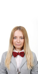 Stylish girl with a red butterfly in a jacket on a white background