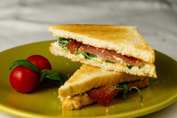 Sandwich with cheese and basil spread and carpaccio