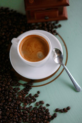 coffee cup americano and coffee beans