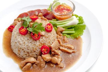 Brown rice chicken with sauce served with chinese sausage, chili and vegetable