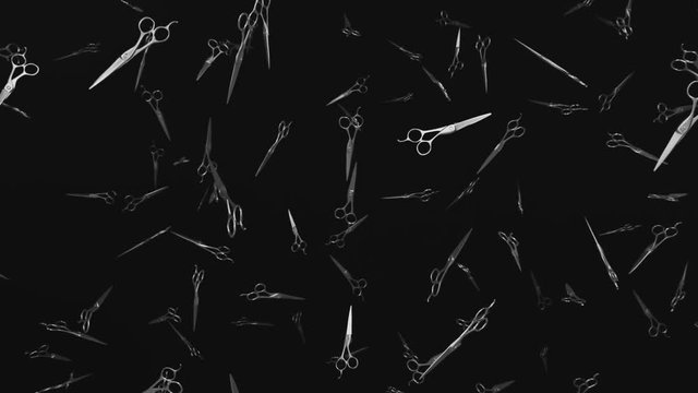 Looping 3d animation of chrome barbers scissors floating in space and slowly rotating against a dark background.
