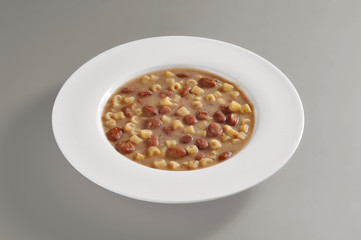 Dish with pasta and beans portion