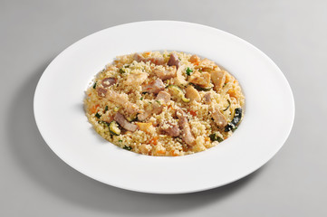 Dish of cous cous and meat