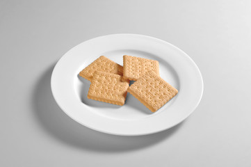 Obraz na płótnie Canvas Round dish with biscuits