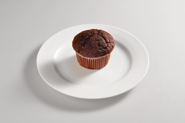 Round dish with chocolate muffins