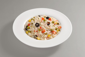 Round dish with rice salad