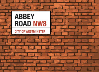 Abbey Road London Street Sign On A Brick Background
