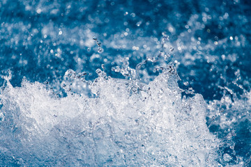 Splashing water in the pool as a background