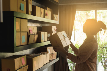 silhouette scene of young entrepreneur, teenager business owner work at home, alpha generation life style, online business conceptual