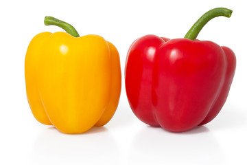 Red and yellow sweet pepper on a white background