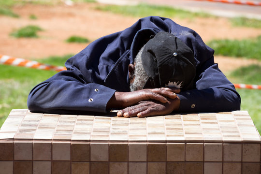 Man asleep on a table in Johannesburg, South Africa. Picture: DANIEL BORN