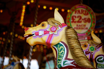 Head of a colorful carousel horse