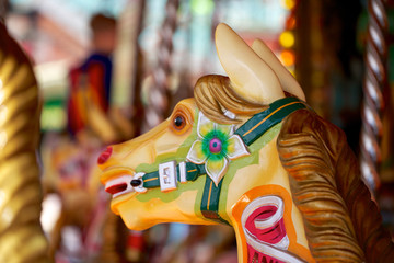 Head of a colorful carousel horse