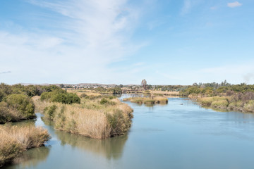 Fototapeta na wymiar Orange River (Gariep River) with Groblershoop in the back