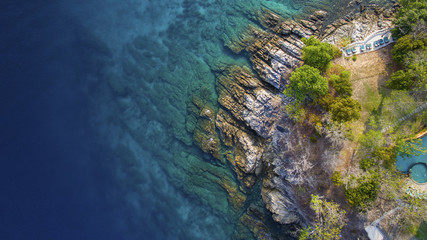 aerial view of beuatiful blue ocean and rock coastal in phuket southern of thailand