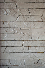 Gray brick wall texture grunge background with vignetted corners, can be used for interior design