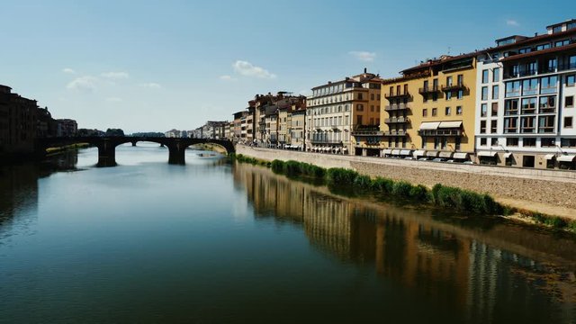 Arno River with bridge. Florence, Italy. 4K 10 bit video