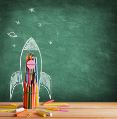 Back To School - Rocket Sketch On Blackboard
