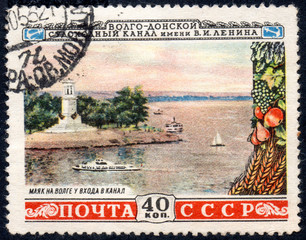 UKRAINE - CIRCA 2017: A postage stamp printed in USSR shows Volga lighthouse at the gate of the...