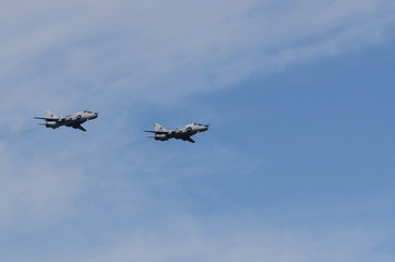 Fototapeta na wymiar ATTACK AIRCRAFT - Two military planes in the blue sky 