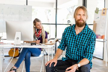 Fototapeta premium Young man working in office