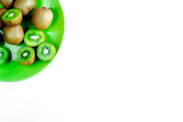 exotic fruit mockup with sliced kiwi on white table background top view
