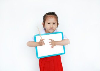 Asian child in school uniform holding empty whiteboard with pencil isolated on white background.
