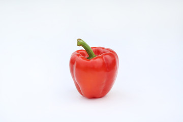 Red Bell pepper isolated on white background.