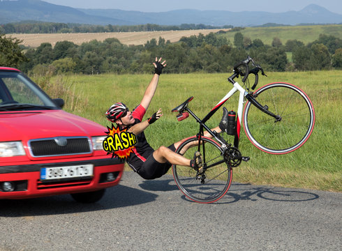 Accident cars with biker. Car collides cyclist on the road. Dangerous traffic on asphalt way on the countryside. Road crash misfortune car with a cyclist.  Careless driving.