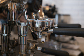 coffee maker machine brewing fresh espresso coffee in cafe