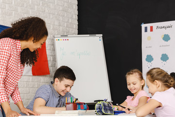 Checking kids homework © Photographee.eu