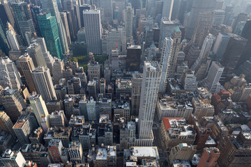 New York City Manhattan skyline aerial view with skyscrapers roof tops and streets in a sunny day