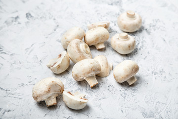 Champignon on a light background. Fresh champignons on a  background