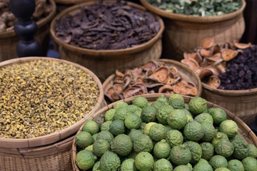 pile of kaffir lime, dried bale fruit, chrysanthemum. herb, health, wellness