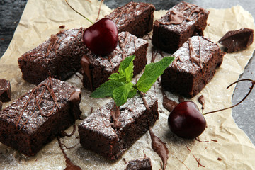 homemade chocolate brownies on grey vintage background, chocolate cake concept