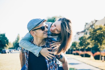 Romantic happy young couple outdoors in a city