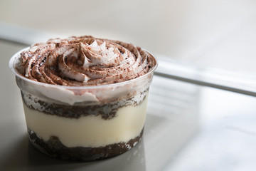 Tiramisu cake, traditional Italian dessert in a cup