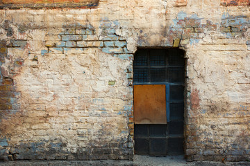 Fototapeta na wymiar Grunge wall texture background with strange window