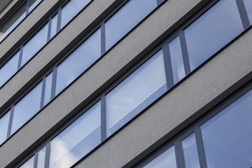 Fototapeta na wymiar Concrete and glass building in Prag