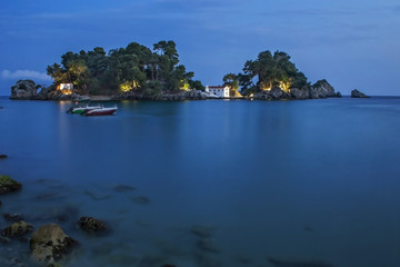 Night scene of Panagias island in Parga, Greece 