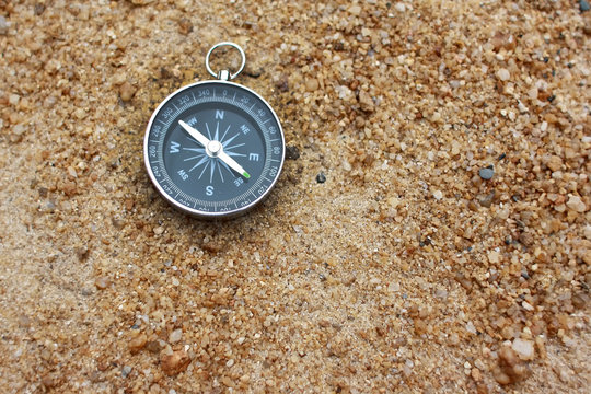 campass on sand