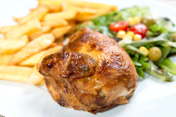 Fresh chicken steak with tomatoes and french fries