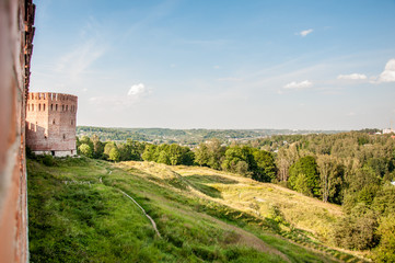 Fototapeta na wymiar Outer space of Smolensk Fortress on the hills with Orel tower on a sunny day