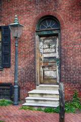 Old Door and Street Lamp