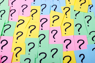 Question marks. Colorful paper notes with question marks. Concept image. Closeup.