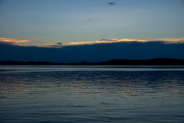 dark blue and calm sunset at Balaton lake in summer