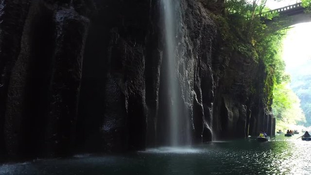 POV of Takachiho, Manai fall of gorge creek. Shot from the moving boat.
