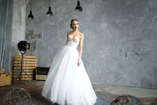 Beautiful bride swirls in a dress