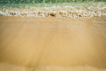 Turquoise waters exceptionally strong colors with yellow fine sand, the coast and the beautiful sunny day