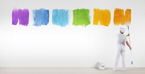 painter man painting varied colors symbol isolated on blank white wall background, banner web